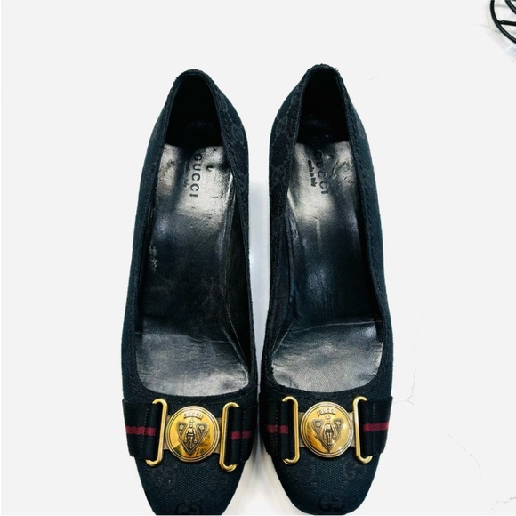 Gucci Black Flats with Gold Emblem